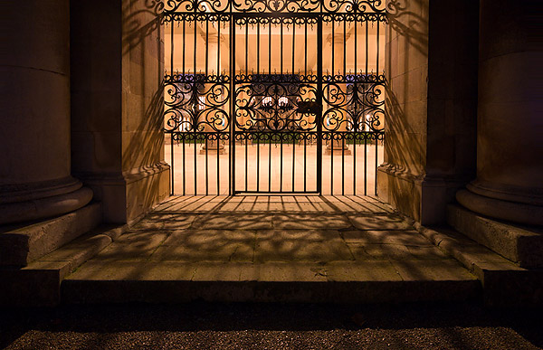 gate at Nevile's Court within Trinity College at Cambridge University in England